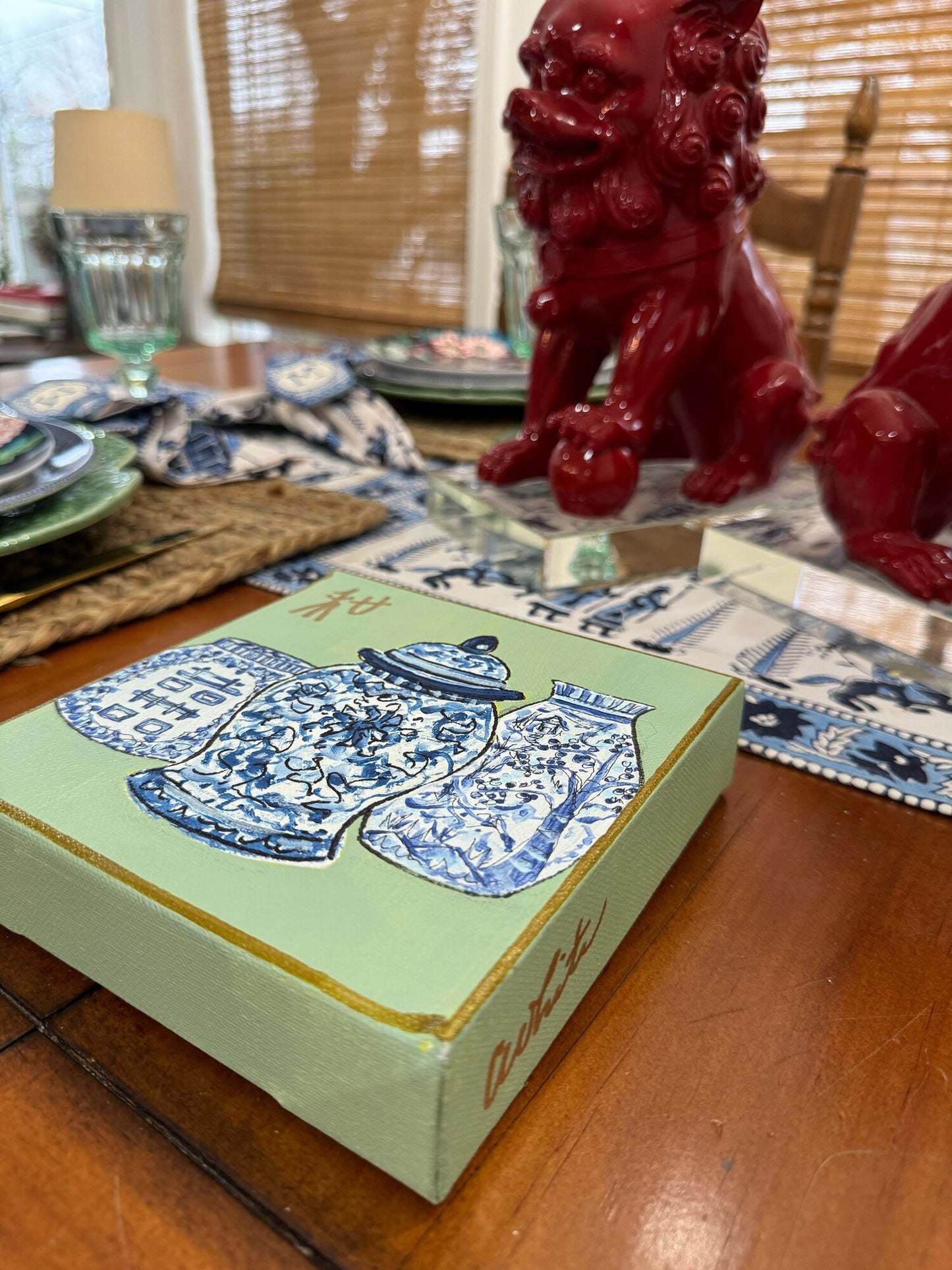 Blue vases on green