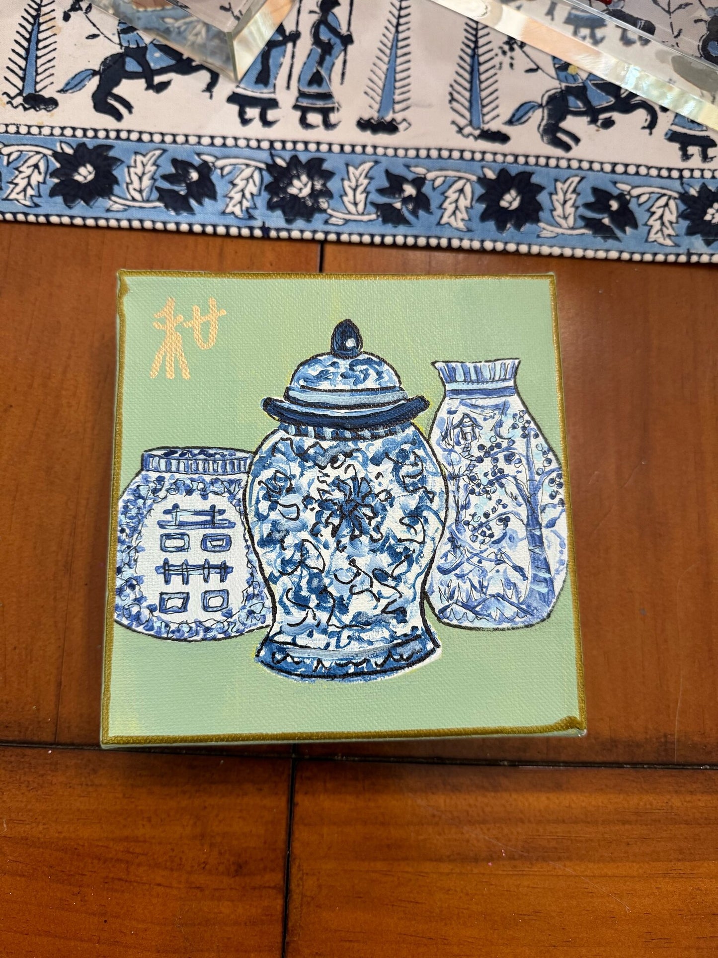 Blue vases on green